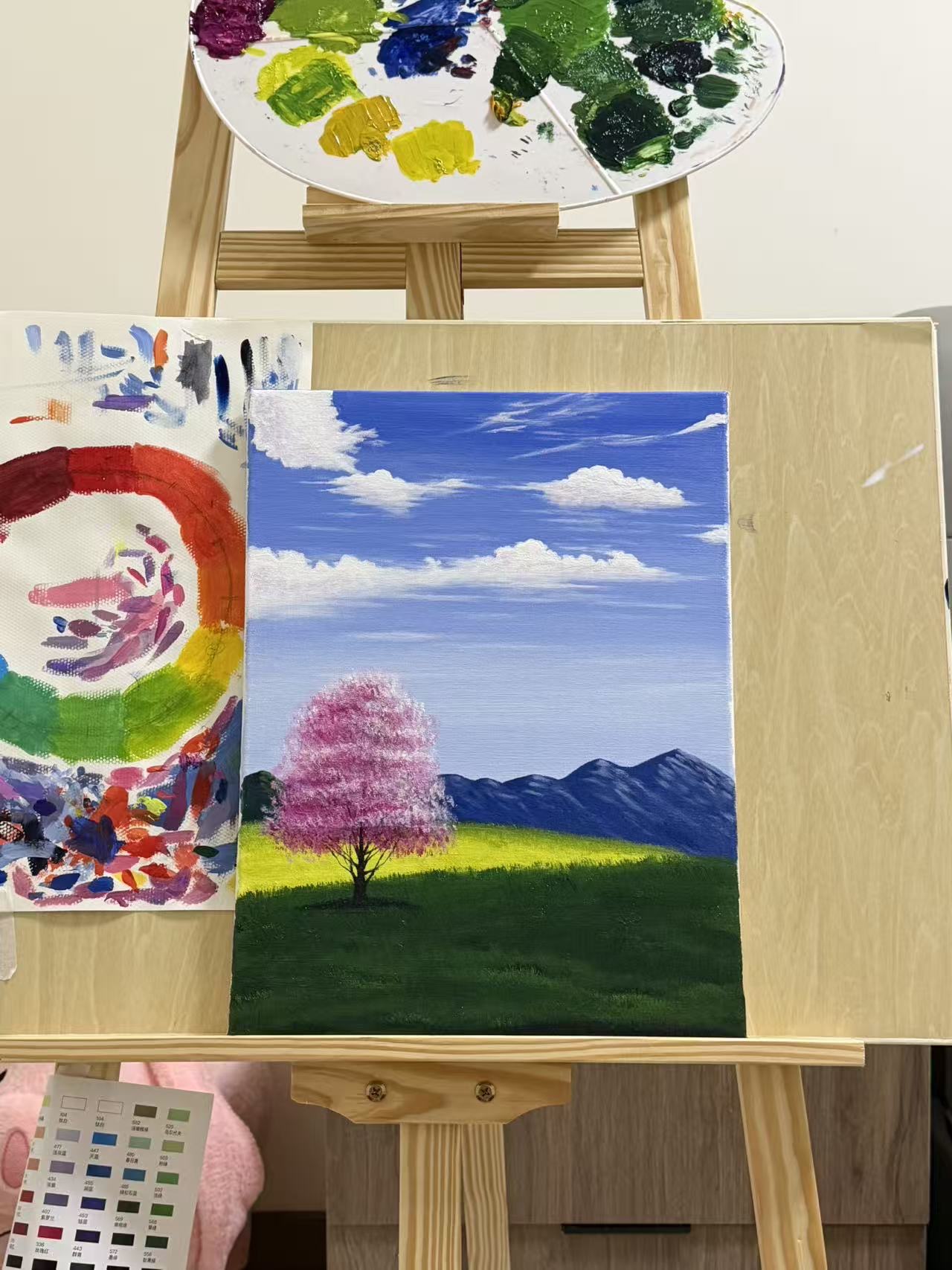 粉色树与远山油画